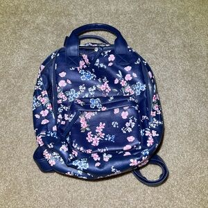 Mini floral print backpack.
